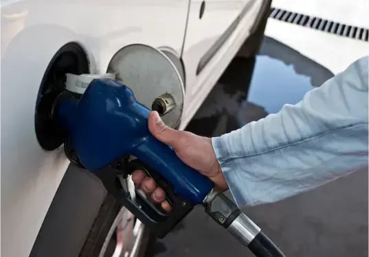 Close-up of a person refuelling a van